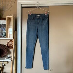 Signature Levi’s Strauss mid rise blue skinny jeans